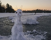 Our snowman guards the skating rink